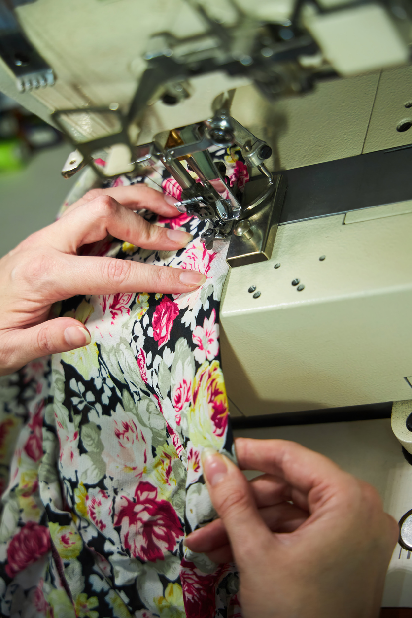 Seamstress sewing detailed fabric